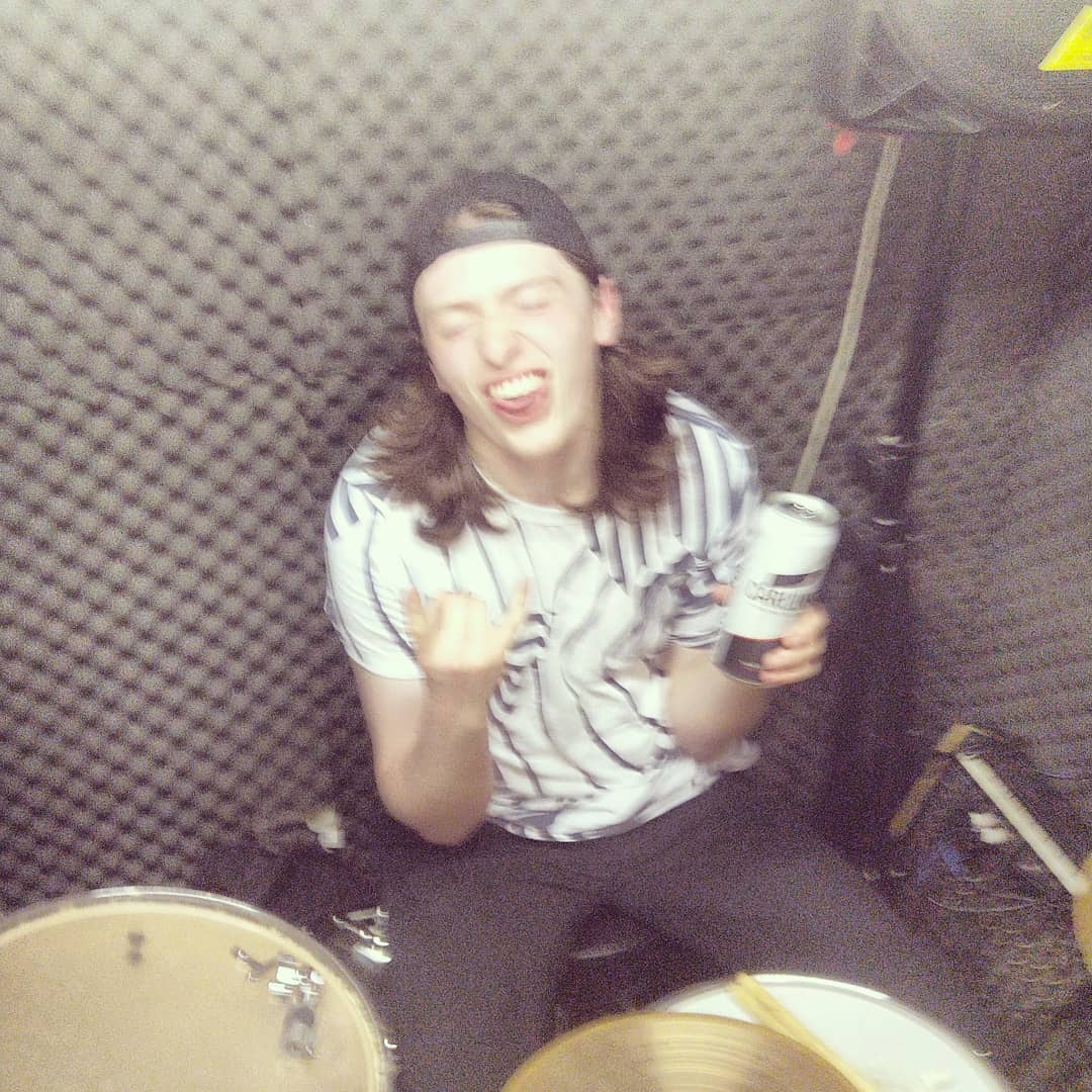 Paul having a laugh and a beer in the rehearsal room